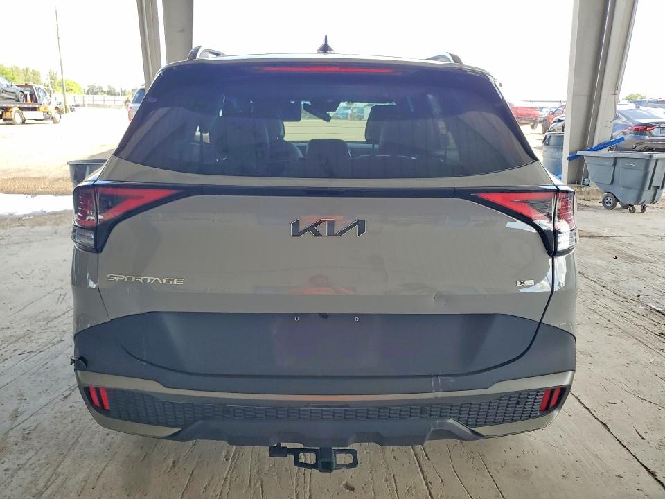 2024 Kia Sportage VIN 5XYK6CDF6RG189705 COPART salvage auction — SIDE, Fl - Cert Of Title Slvg Rebuildable, sold $4,850 on 2026-07-22 (photo 6)