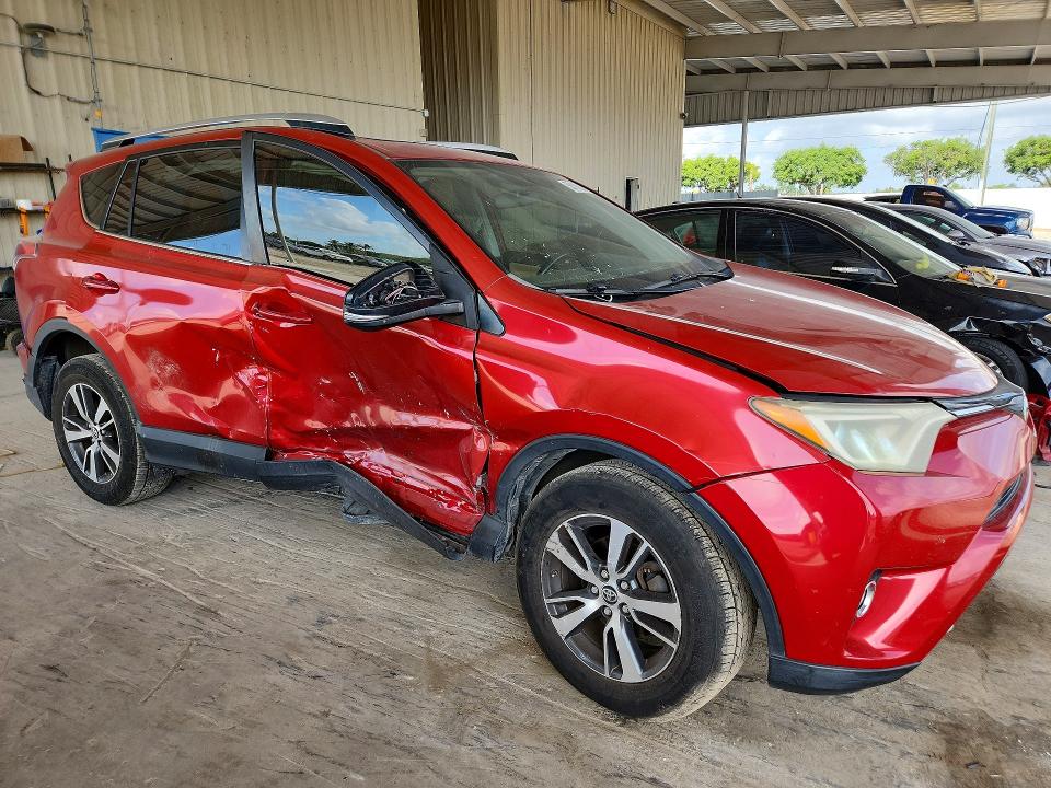 2016 Toyota VIN JTMWFREV4GJ073331 COPART salvage auction — SIDE, Fl - Cert Of Title Slvg Rebuildable, sold $4,050 on 2026-07-22 (photo 4)