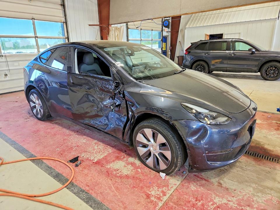 2024 Tesla Model y VIN 7SAYGDEE9RA238745 COPART salvage auction — SIDE, Ny - Mv-907A Salvage Certificate, sold $11,900 on 2026-07-20 (photo 4)