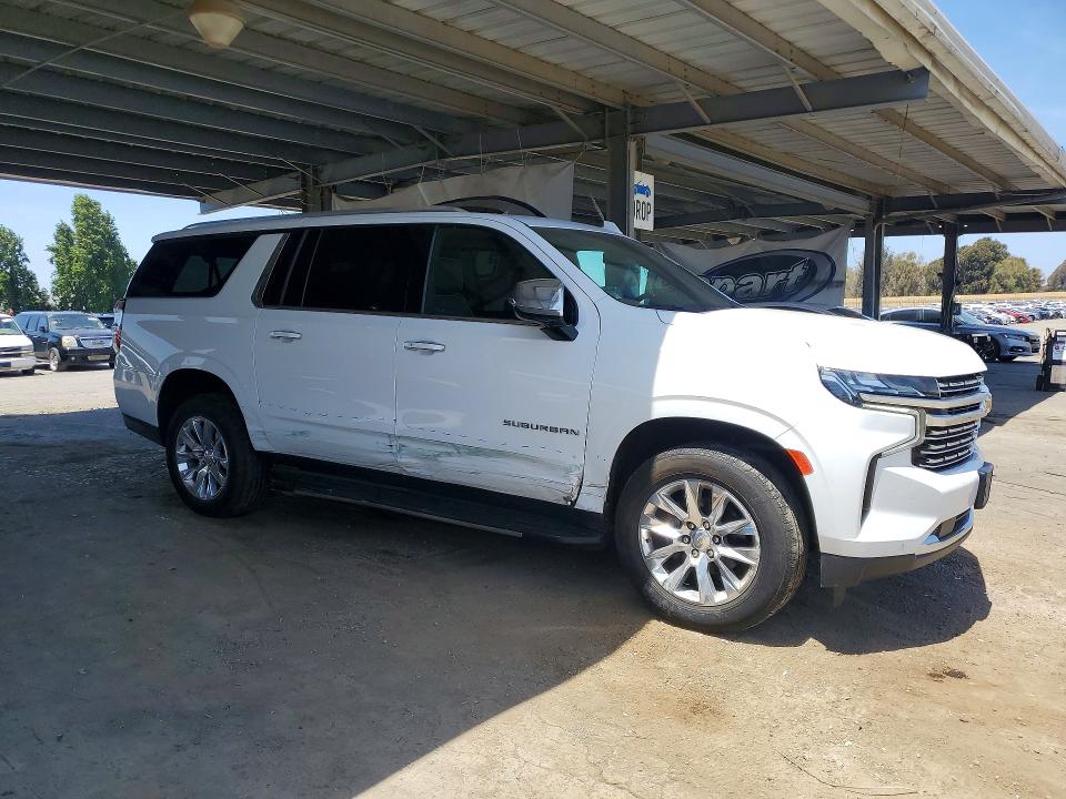 2023 Chevrolet Suburban VIN 1GNSKFKDXPR389314 COPART salvage auction — SIDE, CA - NON-REPAIRABLE VEHICLE CERT, sold $15,400 on 2026-08-03 (photo 4)