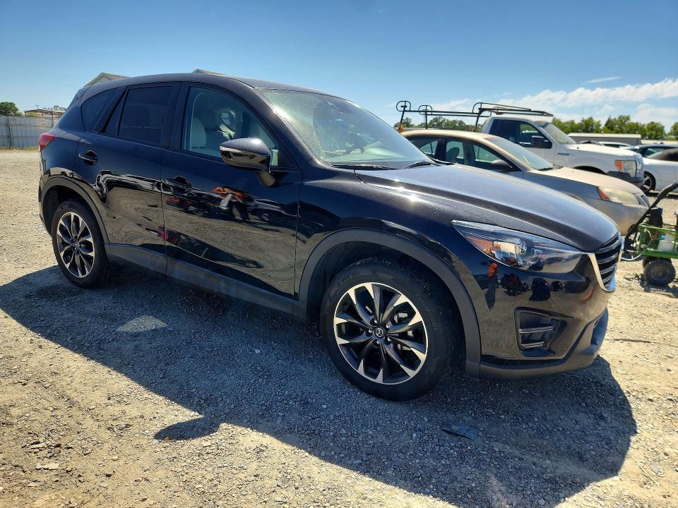 2016 Mazda Cx-5 VIN JM3KE4DY0G0635304 COPART salvage auction — SIDE, CA - SALVAGE CERTIFICATE, sold $15 on 2026-07-21 (photo 4)