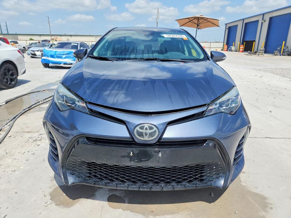 2018 Toyota Corolla VIN 5YFBURHE5JP816565 COPART salvage auction — WATER/FLOOD, TX - SALVAGE TITLE-FLOOD DAMAGE, sold $1,800 on 2026-07-24 (photo 5)