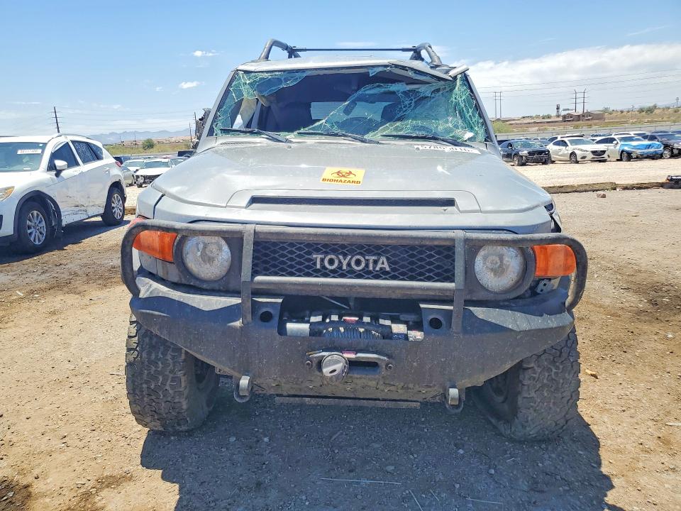2013 Toyota Fj cruiser VIN JTEBU4BF1DK157225 COPART salvage auction — SIDE, AZ - CERT OF TITLE- NON REPAIR, sold $3,800 on 2026-07-31 (photo 5)