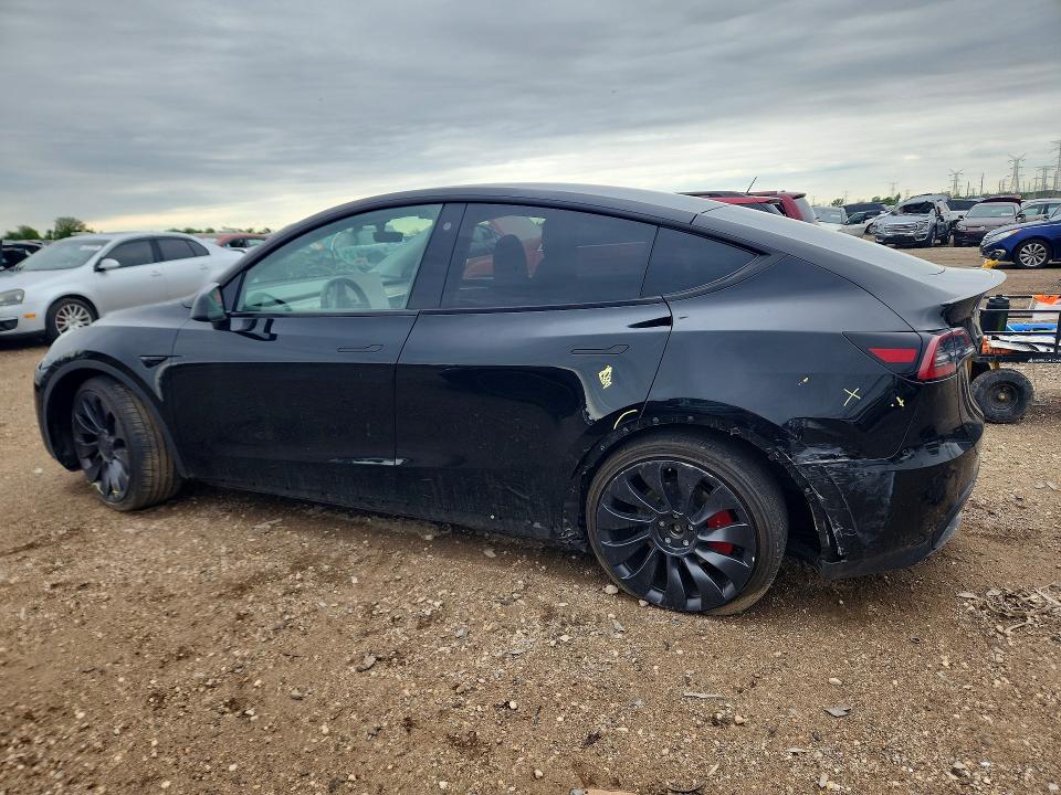 2023 Tesla Model y VIN 7SAYGDEF7PF708666 COPART salvage auction — REAR END, Il - Salvage Certificate, sold $6,000 on 2026-07-28 (photo 2)