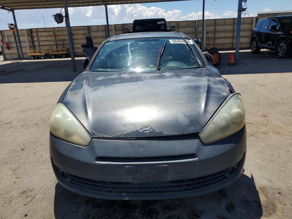 2007 Hyundai Tiburon VIN KMHHM66D17U243934 COPART salvage auction — FRONT END, Tx - Salvage Vehicle Title, sold $275 on 2026-07-10 (photo 5)