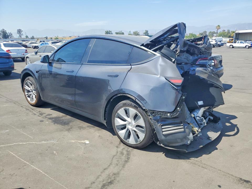 2024 Tesla Model y VIN 7SAYGDEE5RF031434 COPART salvage auction — REAR END, Ca - Salvage Certificate, sold $7,100 on 2026-07-20 (photo 2)