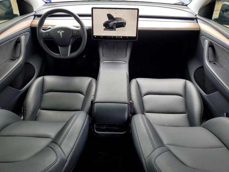 2025 Tesla Model y VIN 7SAYGDED1SA343504 COPART salvage auction — REAR END, TX - SALVAGE VEHICLE TITLE, sold $13,100 on 2026-07-10 (photo 8)