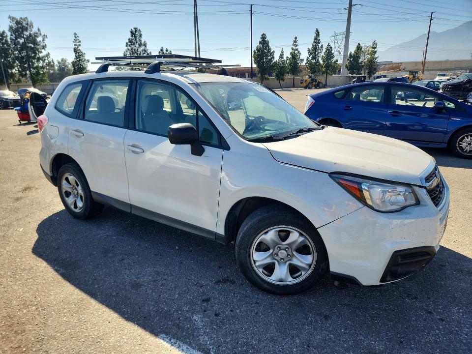 2018 Subaru Forester VIN JF2SJAAC9JH617017 COPART salvage auction — SIDE, Ca - Salvage Certificate, sold $950 on 2026-07-02 (photo 4)