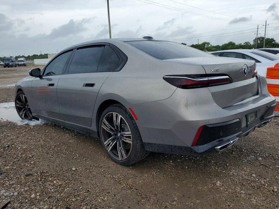 2024 BMW VIN WBA33EJ00RCR45958 COPART salvage auction — SIDE, TX - SALVAGE VEHICLE TITLE (P), sold $37,250 on 2026-07-16 (photo 2)