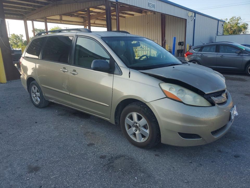 2009 Toyota Sienna VIN 5TDZK23C09S273422 COPART salvage auction — FRONT END, FL - CERT OF TITLE SLVG REBUILDABLE, sold $700 on 2026-07-14 (photo 4)