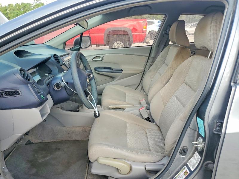 2010 Honda Insight VIN JHMZE2H57AS020366 COPART salvage auction — REAR END, Tx - Salvage Vehicle Title, sold $475 on 2026-07-28 (photo 7)