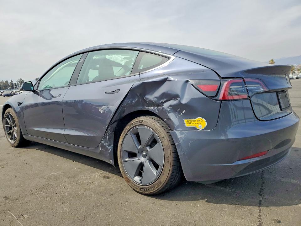 2022 Tesla Model 3 VIN 5YJ3E1EBXNF323012 COPART salvage auction — REAR END, Ca - Salvage Certificate, sold $8,700 on 2026-07-13 (photo 2)