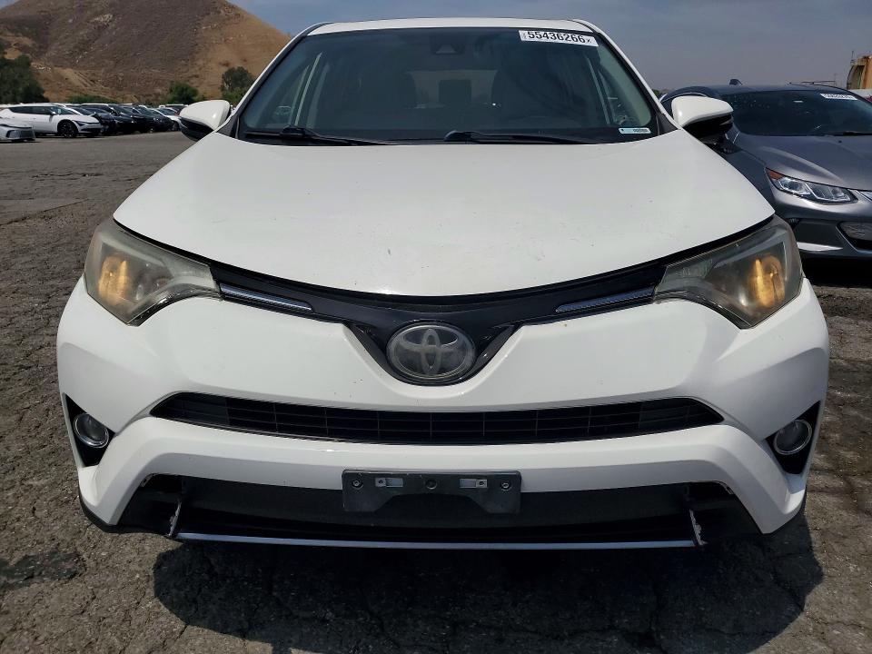 2018 Toyota Rav 4 VIN JTMWFREV1JJ730819 COPART salvage auction — MINOR DENT/SCRATCHES, Ca - Salvage Certificate, sold $7,700 on 2026-07-02 (photo 6)