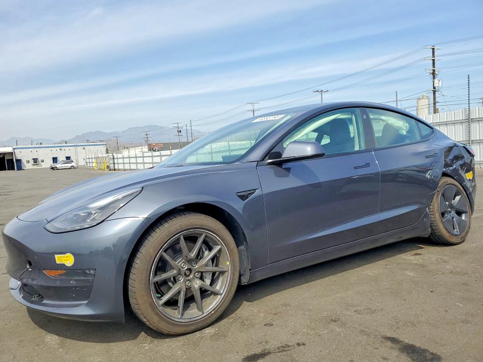 2022 Tesla Model 3 VIN 5YJ3E1EBXNF323012 COPART salvage auction — REAR END, Ca - Salvage Certificate, sold $8,700 on 2026-07-13 (photo 1)