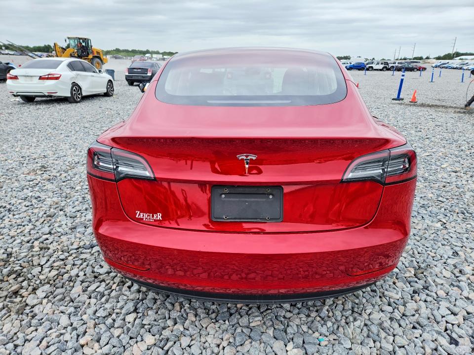 2019 Tesla Model 3 VIN 5YJ3E1EA9KF308357 COPART salvage auction — SIDE, Fl - Cert Of Title Slvg Rebuildable, sold $6,600 on 2026-07-07 (photo 6)