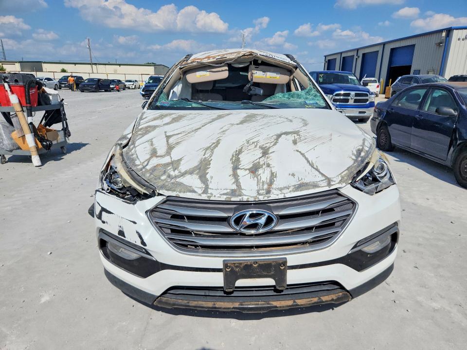 2017 Hyundai VIN 5XYZU3LB5HG398340 COPART salvage auction — ROLLOVER, Tx - Nonrepairable Title, sold $950 on 2026-07-24 (photo 5)