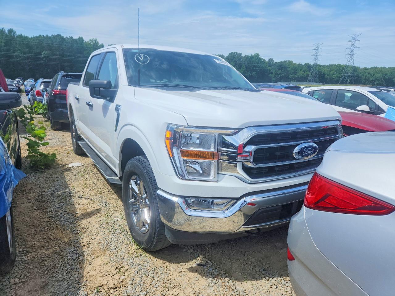 2023 Ford F-150 Lightning VIN 1FTEW1EP2PKD32567 COPART salvage auction — Side, TN - SALVAGE CERTIFICATE, sold $14,800 on 2026-07-03 (photo 5)