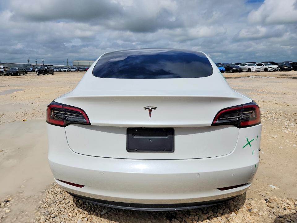 2021 Tesla VIN 5YJ3E1EA3MF017274 COPART salvage auction — SIDE, Tx - Salvage Vehicle Title, sold $70 on 2026-07-30 (photo 6)