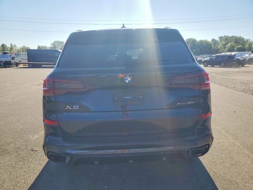 2021 BMW VIN 5UXCR6C01M9G23275 COPART salvage auction — FRONT END, Or - Salvage Title Certificate, sold $12,700 on 2026-07-22 (photo 6)