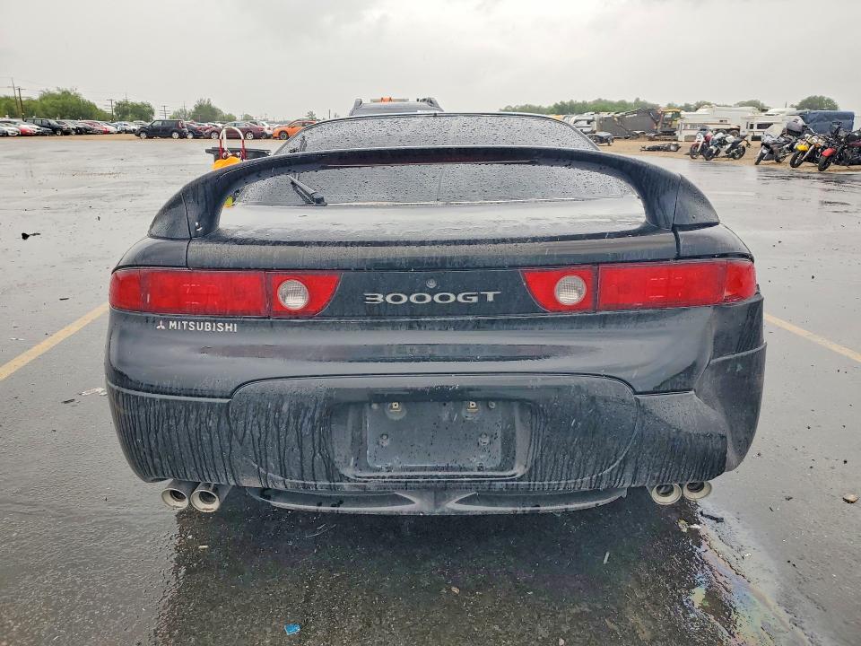 1997 Mitsubishi 3000 gt VIN JA3AM44H3VY006379 COPART salvage auction — FRONT END, Id - Salvage Certificate Of Title, sold $90 on 2026-07-23 (photo 6)