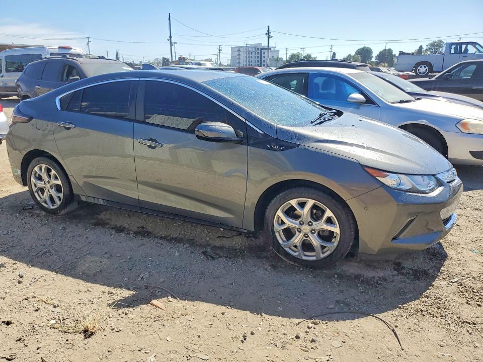 2017 Chevrolet VIN 1G1RD6S53HU113512 COPART salvage auction — NORMAL WEAR, Fl - Dis/Dlr/Exp Only Clean Title, sold $2,350 on 2026-07-06 (photo 4)