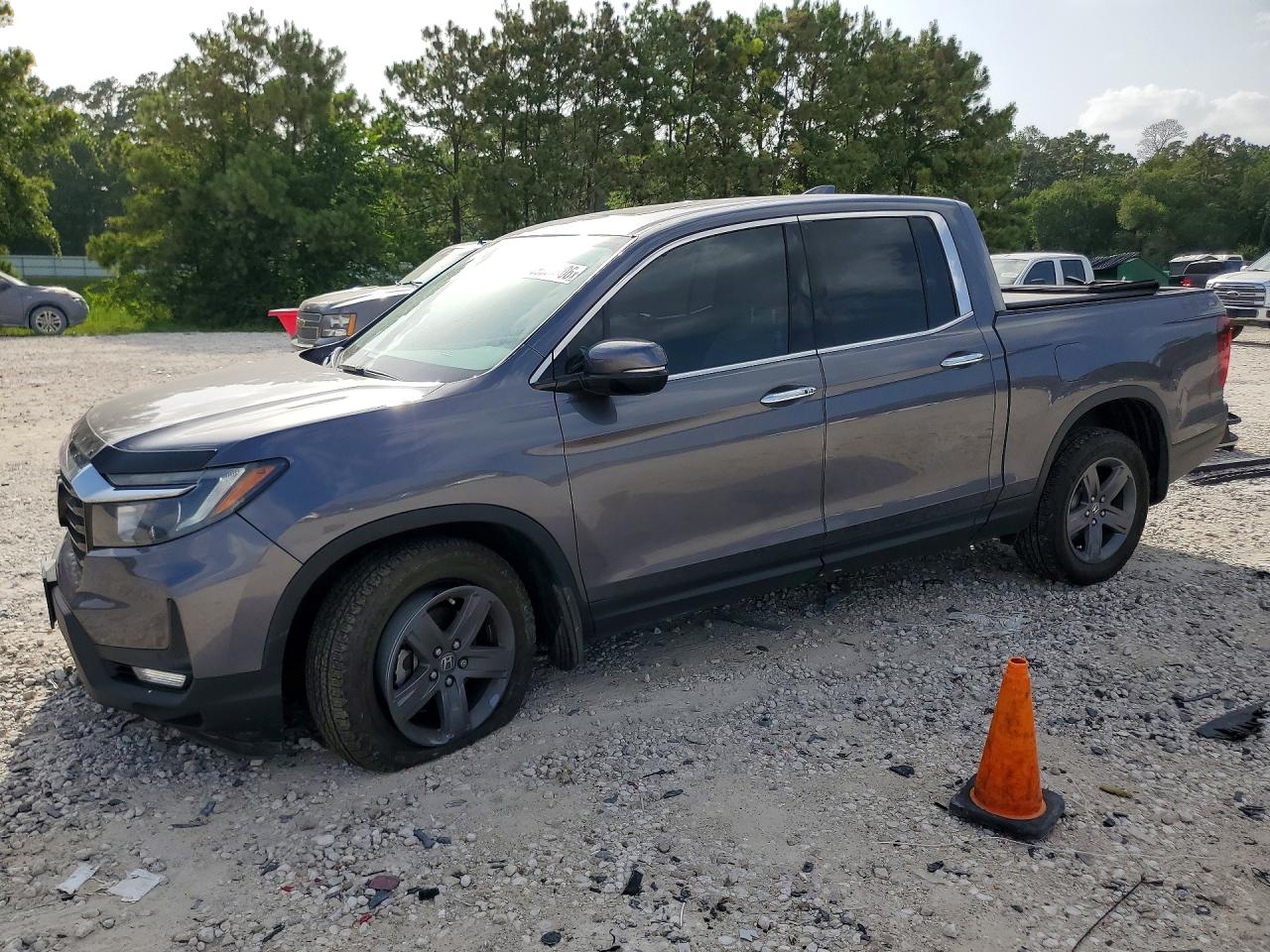 2021 Honda Ridgeline VIN 5FPYK3F76MB005575 — COPART salvage auction photo