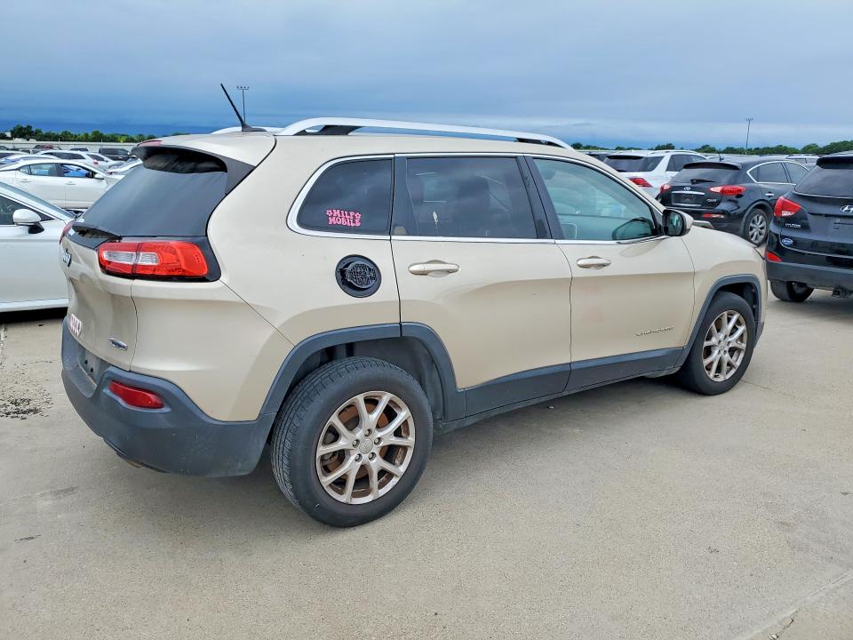 2014 Jeep Cherokee VIN 1C4PJLCS2EW297397 COPART salvage auction — SIDE, Tx - Certificate Of Title, sold $1,100 on 2026-07-09 (photo 3)