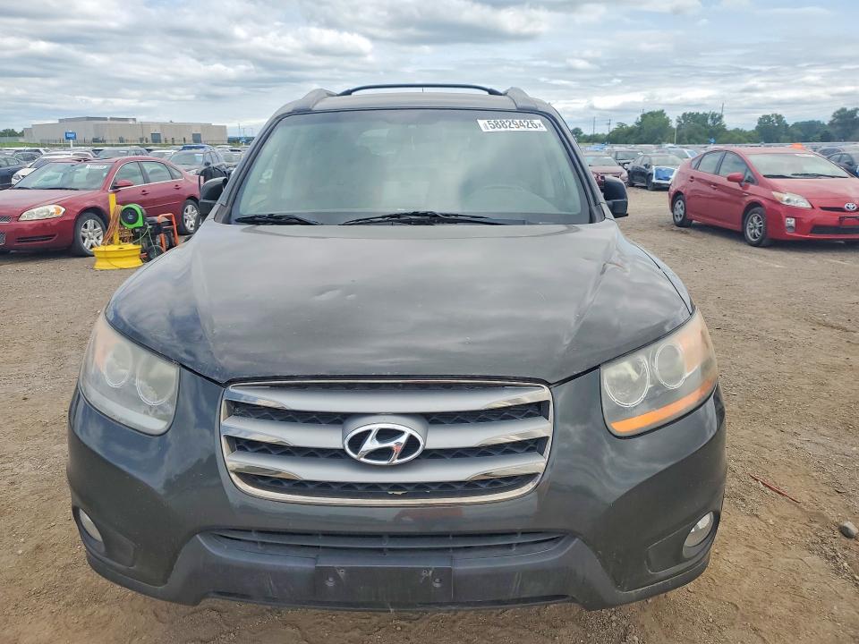 2012 Hyundai Santa fe VIN 5XYZHDAG7CG107094 COPART salvage auction — MECHANICAL, Ia - Certificate Of Title, sold $650 on 2026-07-06 (photo 5)