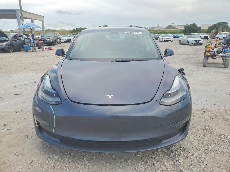2023 Tesla Model 3 VIN 5YJ3E1EA9PF683950 COPART salvage auction — REAR END, FL - CERT OF TITLE SLVG REBUILDABLE, sold $1,950 on 2026-07-23 (photo 5)