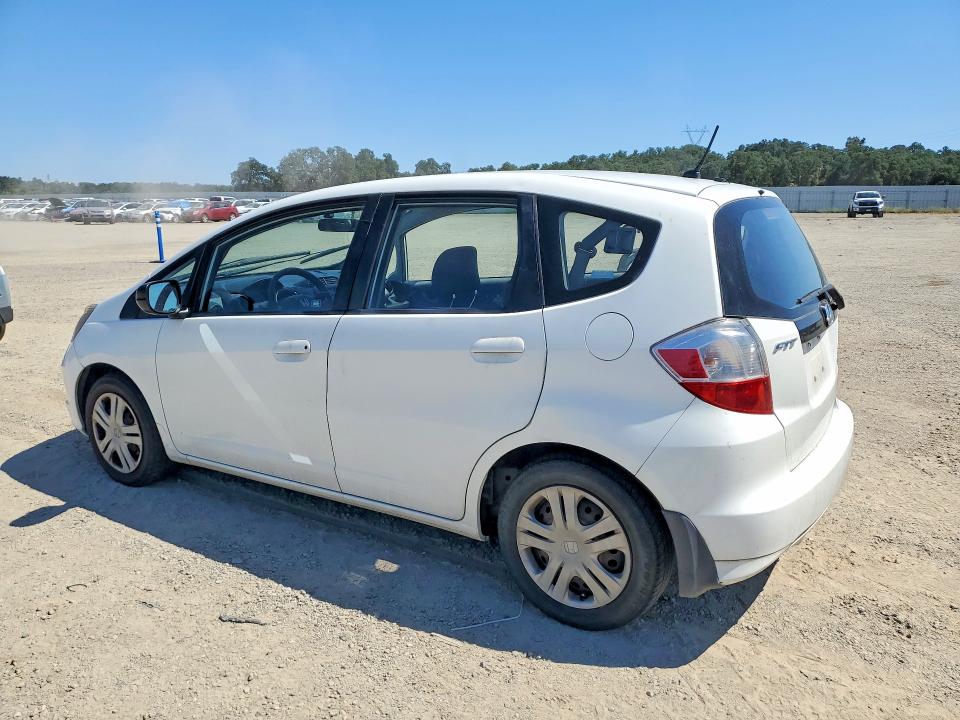 2009 Honda Fit VIN JHMGE882X9S021913 COPART salvage auction — MECHANICAL, Ca - Dis/Dlr/Exp Only Clean Title, sold $975 on 2026-07-10 (photo 2)