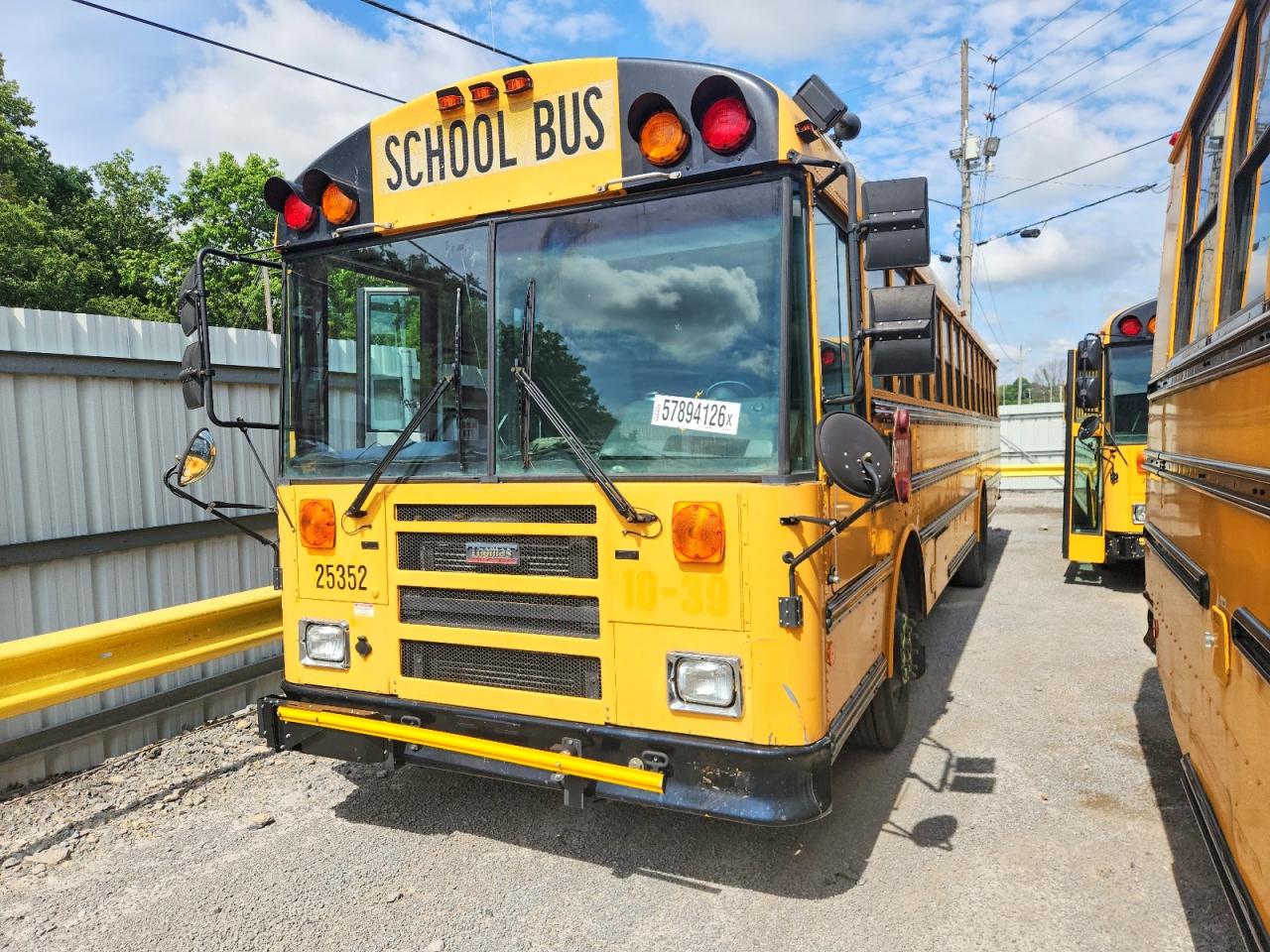 2011 Thomas Saf-t-line VIN 1T88S4E21B1132498 COPART salvage auction — Minor Dent/Scratches, TN - CERTIFICATE OF TITLE, sold $2,000 on 2026-09-08 (photo 2)