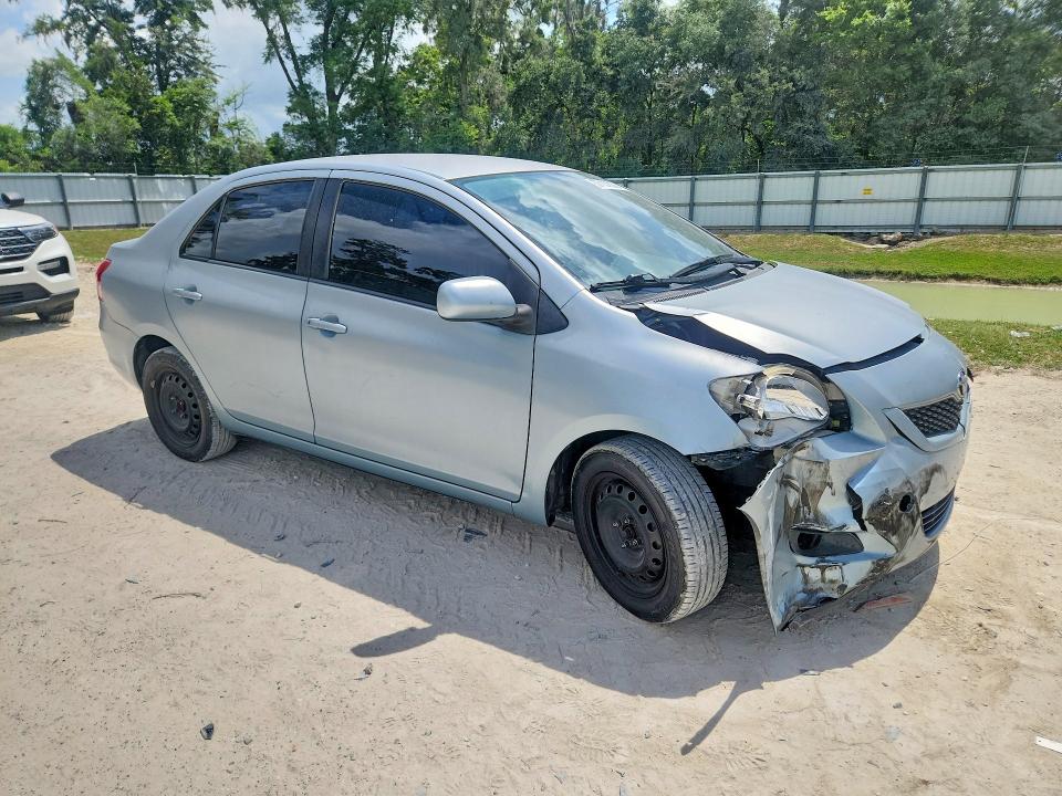 2009 Toyota Yaris VIN JTDBT903991305695 COPART salvage auction — FRONT END, FL - CERT OF TITLE SLVG REBUILDABLE, sold $275 on 2026-07-21 (photo 4)