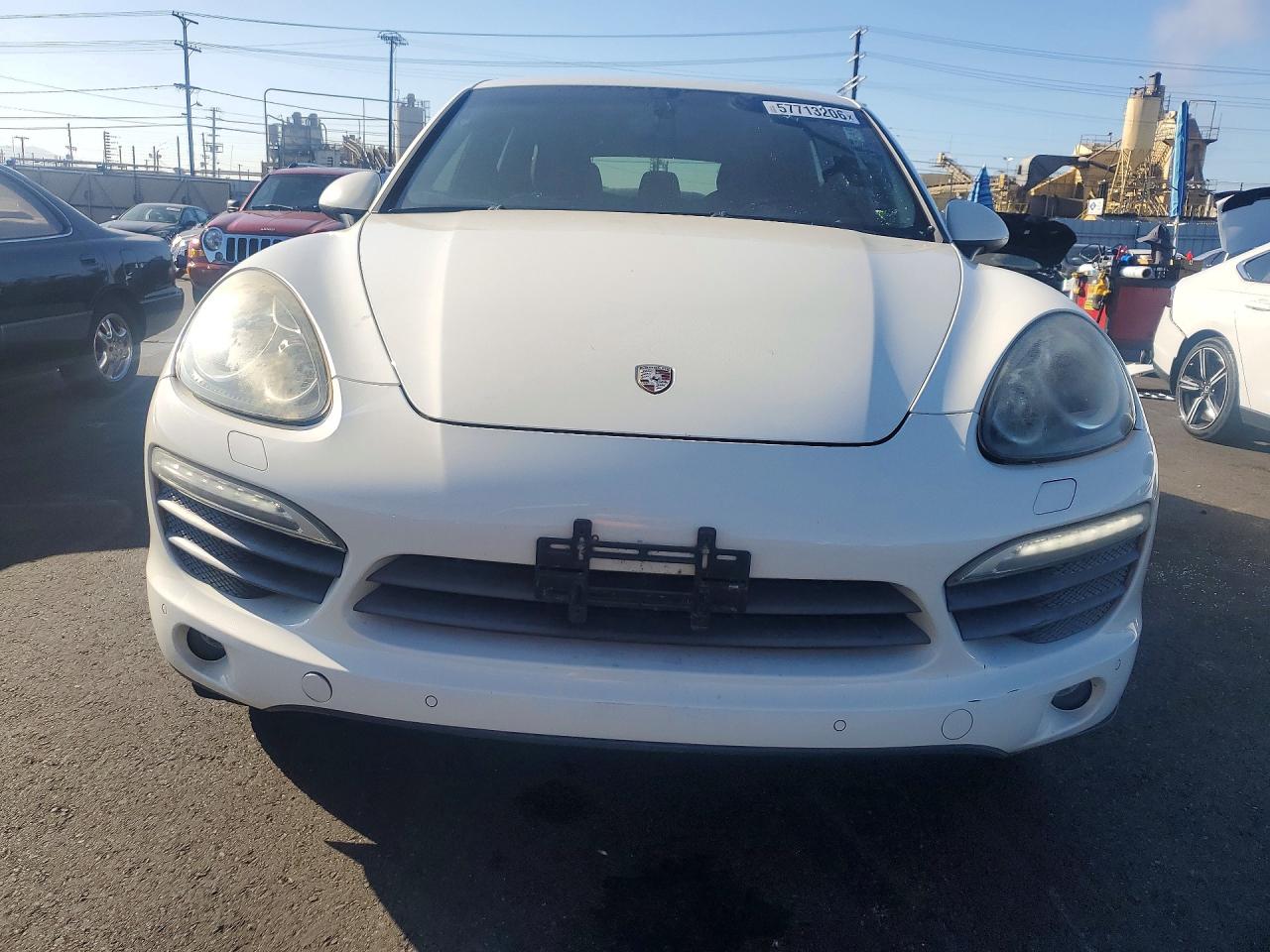2011 Porsche Cayenne VIN WP1AB2A25BLA42058 COPART salvage auction — Side, FL - DIS/DLR/EXP ONLY CLEAN TITLE, sold $1,150 on 2026-07-08 (photo 5)