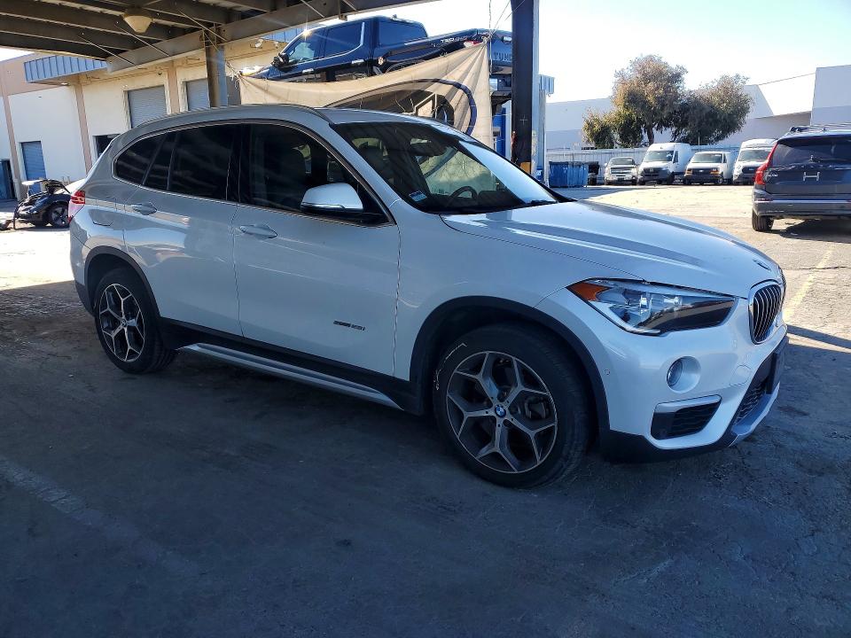 2018 BMW X1 VIN WBXHU7C37J5H40662 COPART salvage auction — REAR END, Ca - Salvage Certificate, sold $3,850 on 2026-07-23 (photo 4)
