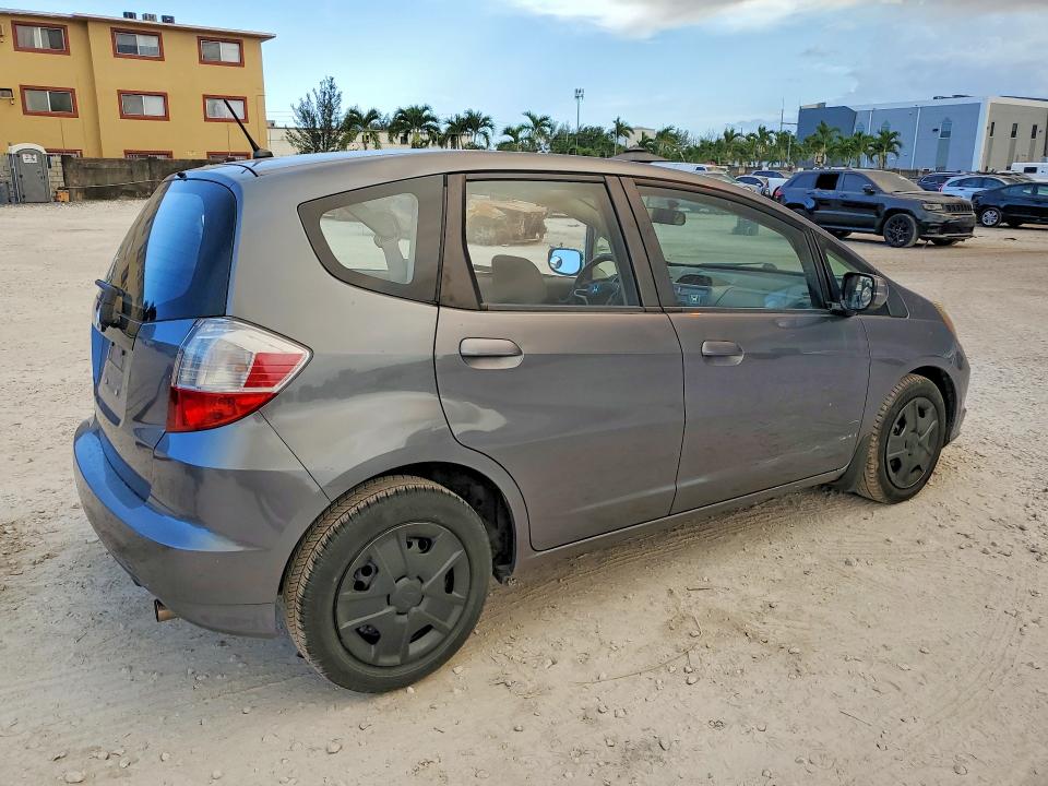 2013 Honda Fit VIN JHMGE8H35DC021104 COPART salvage auction — SIDE, Fl - Cert Of Title Slvg Rebuildable, sold $1,550 on 2026-07-14 (photo 3)