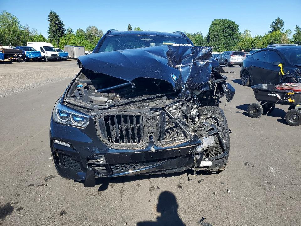 2021 BMW VIN 5UXCR6C01M9G23275 COPART salvage auction — FRONT END, Or - Salvage Title Certificate, sold $12,700 on 2026-07-22 (photo 5)
