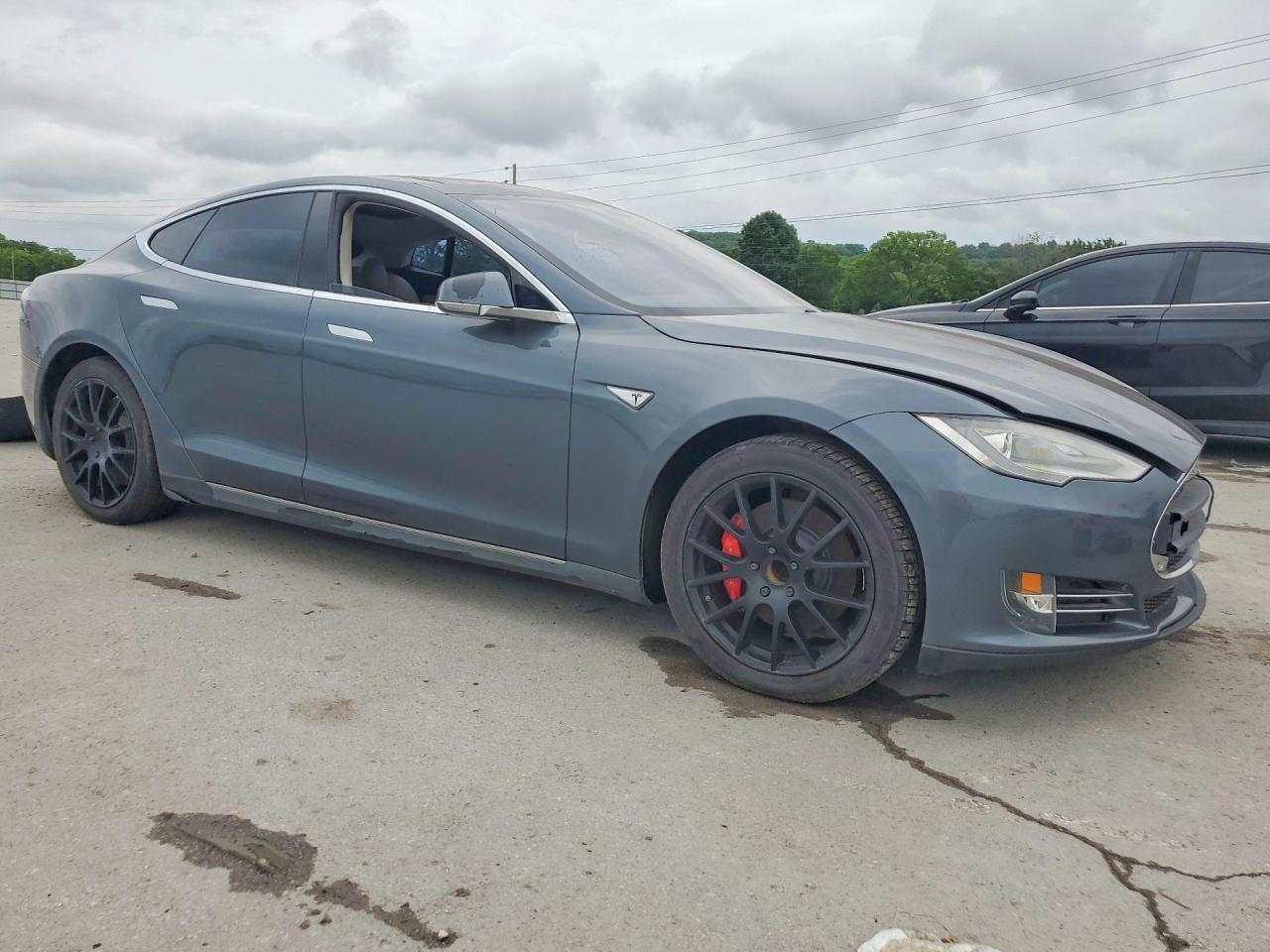 2014 Tesla Model S VIN 5YJSA1H12EFP28985 COPART salvage auction — Normal Wear, TN - CERTIFICATE OF TITLE (P), sold $2,350 on 2026-07-01 (photo 4)