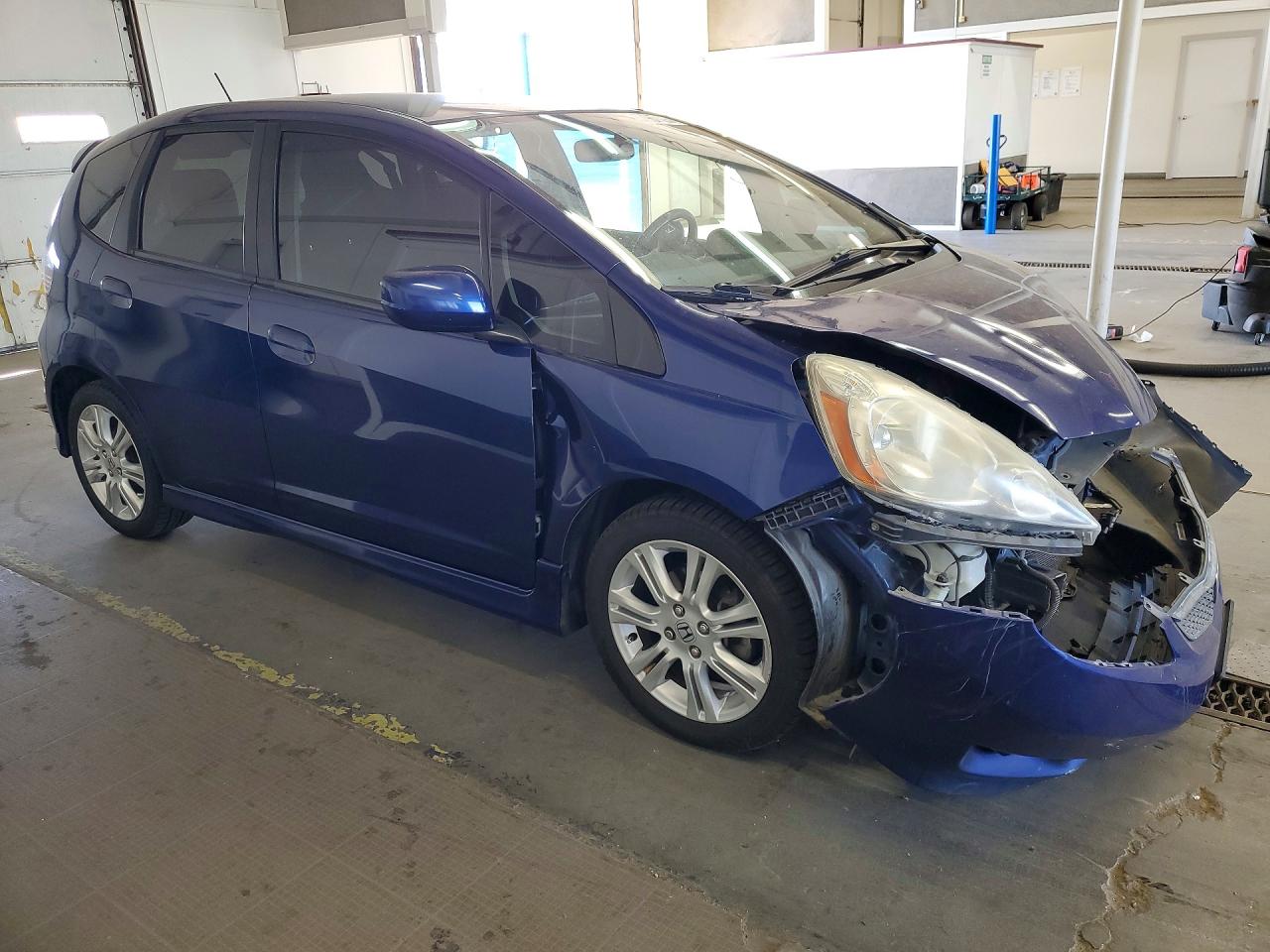 2011 Honda Fit VIN JHMGE8H55BC015303 COPART salvage auction — Front End, Bs - Salvage Title, sold $450 on 2026-09-25 (photo 4)