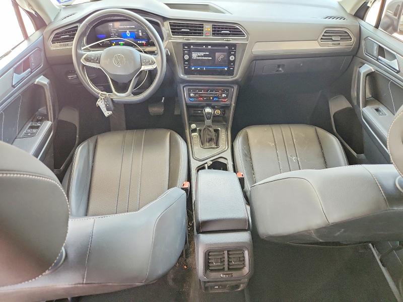 2023 Volkswagen Tiguan VIN 3VV3B7AX0PM084289 COPART salvage auction — SIDE, Tx - Salvage Vehicle Title, sold $9,500 on 2026-08-21 (photo 8)