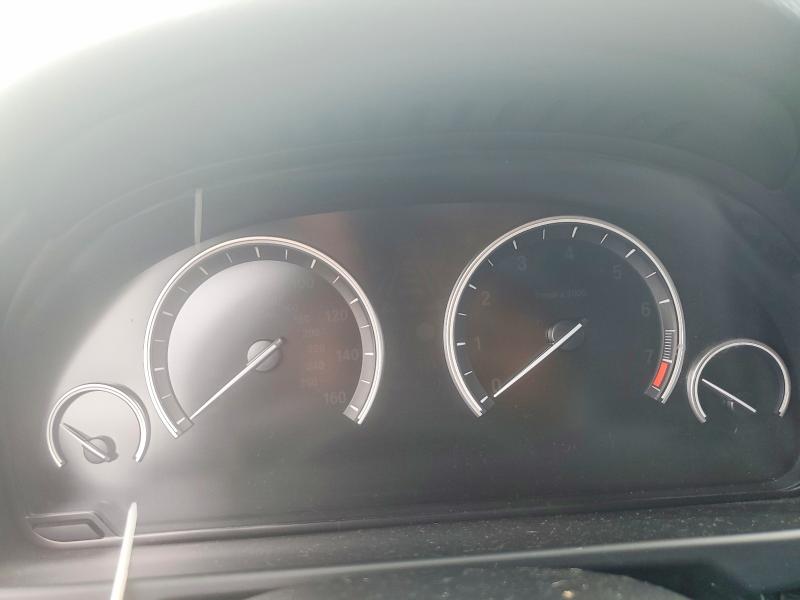 2015 BMW VIN 5UXKR0C59F0K69630 COPART salvage auction — MINOR DENT/SCRATCHES, Tx - Certificate Of Title (P), sold $1,100 on 2026-07-09 (photo 9)