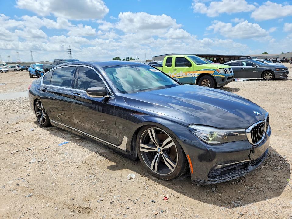 2018 BMW 7er VIN WBA7E2C57JG741481 COPART salvage auction — MINOR DENT/SCRATCHES, Tx - Certificate Of Title, sold $4,350 on 2026-07-28 (photo 4)