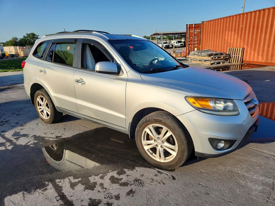 2012 Hyundai Santa fe VIN 5XYZK3ABXCG128084 COPART salvage auction — SIDE, Fl - Cert Of Title Slvg Rebuildable, sold $1,150 on 2026-07-16 (photo 4)