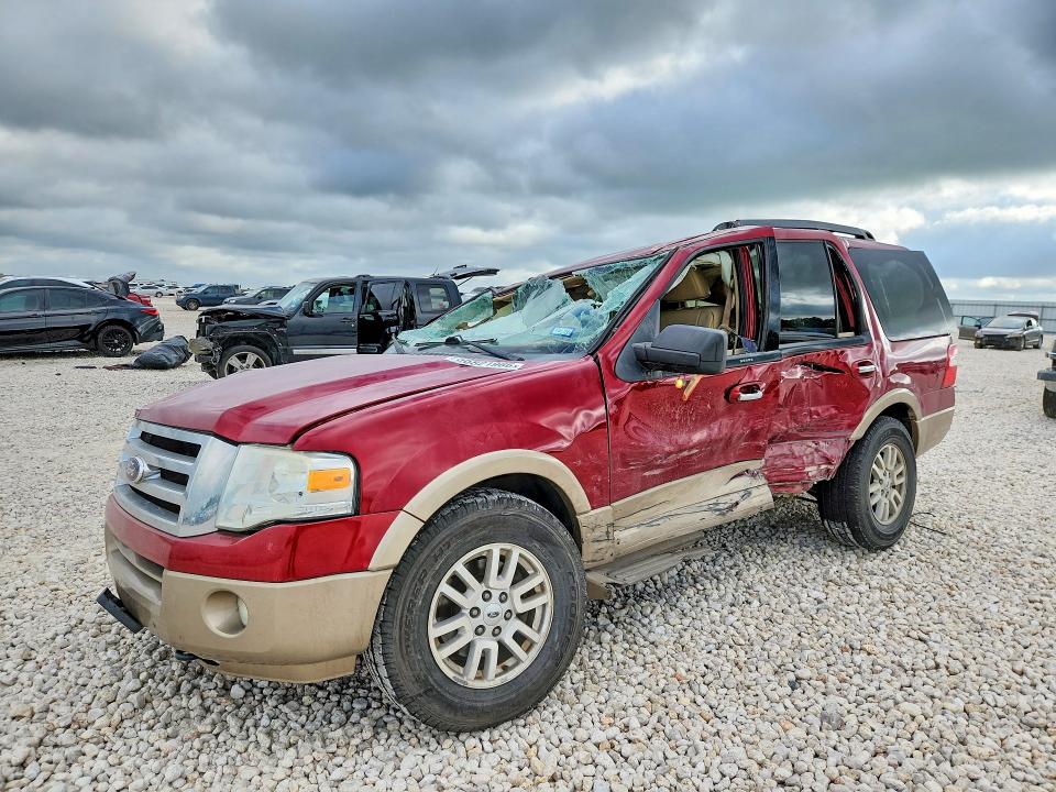 2014 Ford VIN 1FMJU1J56EEF18418 COPART salvage auction — ROLLOVER, Tx - Salvage Vehicle Title, sold $600 on 2026-07-02 (photo 1)