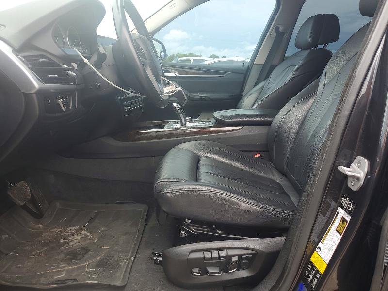 2015 BMW VIN 5UXKR0C59F0K69630 COPART salvage auction — MINOR DENT/SCRATCHES, Tx - Certificate Of Title (P), sold $1,100 on 2026-07-09 (photo 7)