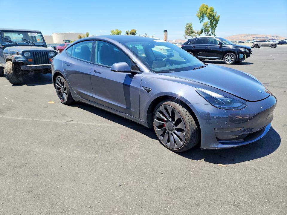 2023 Tesla VIN 5YJ3E1EC0PF398474 COPART salvage auction — SIDE, Ca - Salvage Certificate, sold $12,600 on 2026-07-08 (photo 4)