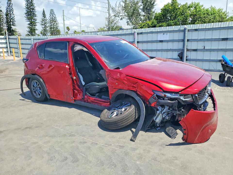 2026 Mazda Cx-5 VIN JM3KMBHA2T0104362 COPART salvage auction — SIDE, Fl - Cert Of Title Slvg Rebuildable, sold $3,100 on 2026-07-22 (photo 4)