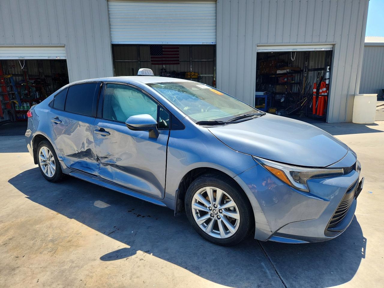 2024 Toyota Corolla VIN JTDBCMFE5RJ016390 COPART salvage auction — Side, CA - CERTIFICATE OF TITLE, sold $7,300 on 2026-07-09 (photo 4)