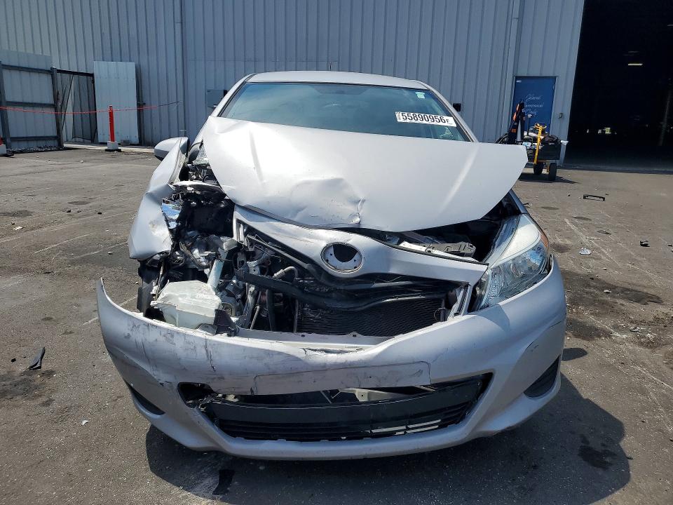 2012 Toyota Yaris VIN JTDKTUD37CD517224 COPART salvage auction — FRONT END, Fl - Cert Of Title Slvg Rebuildable, sold $1,050 on 2026-07-08 (photo 5)