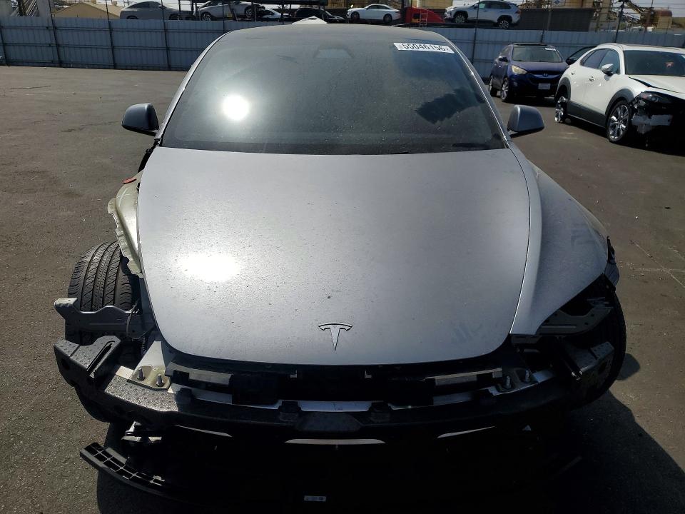 2025 Tesla VIN 5YJ3E1EA7SF965321 COPART salvage auction — FRONT END, Ca - Salvage Certificate, sold $12,600 on 2026-07-13 (photo 5)