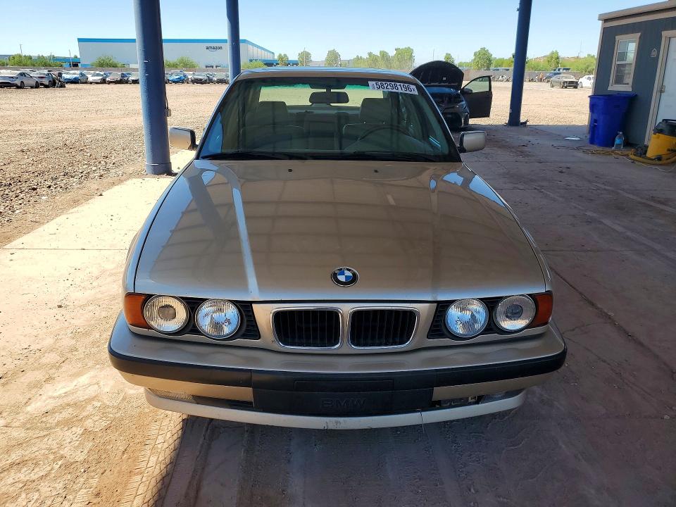 1995 BMW 5 series VIN WBAHD6326SGK56674 COPART salvage auction — MINOR DENT/SCRATCHES, Az - Cert Of Title-Restored Salvage, sold $2,200 on 2026-07-02 (photo 5)